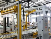 通過式覆頂膜機+搖臂纏繞機